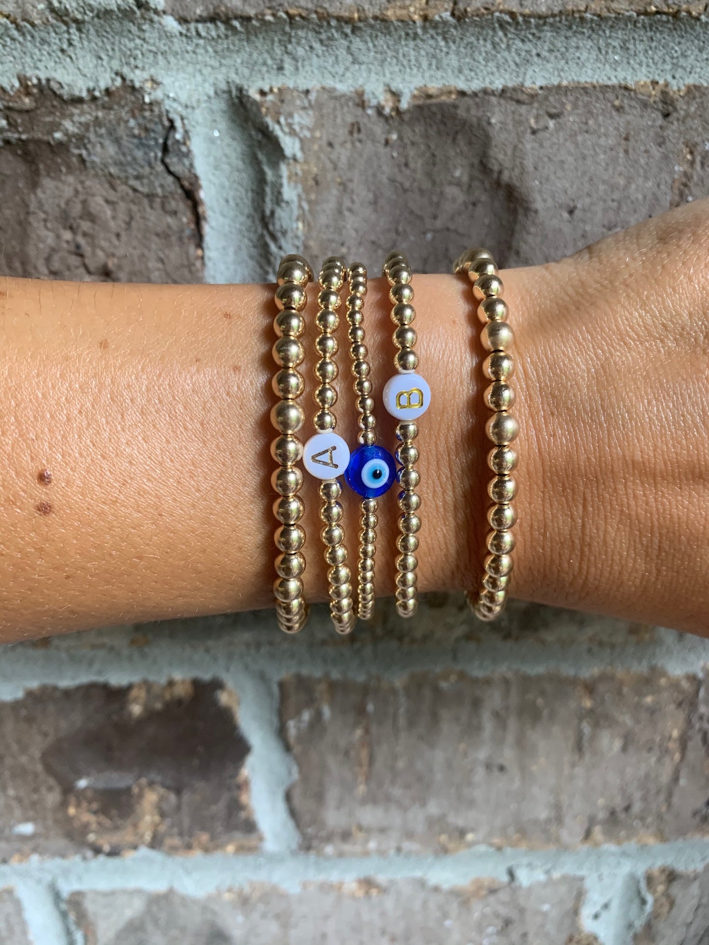 gold bracelets with Evil Eye
