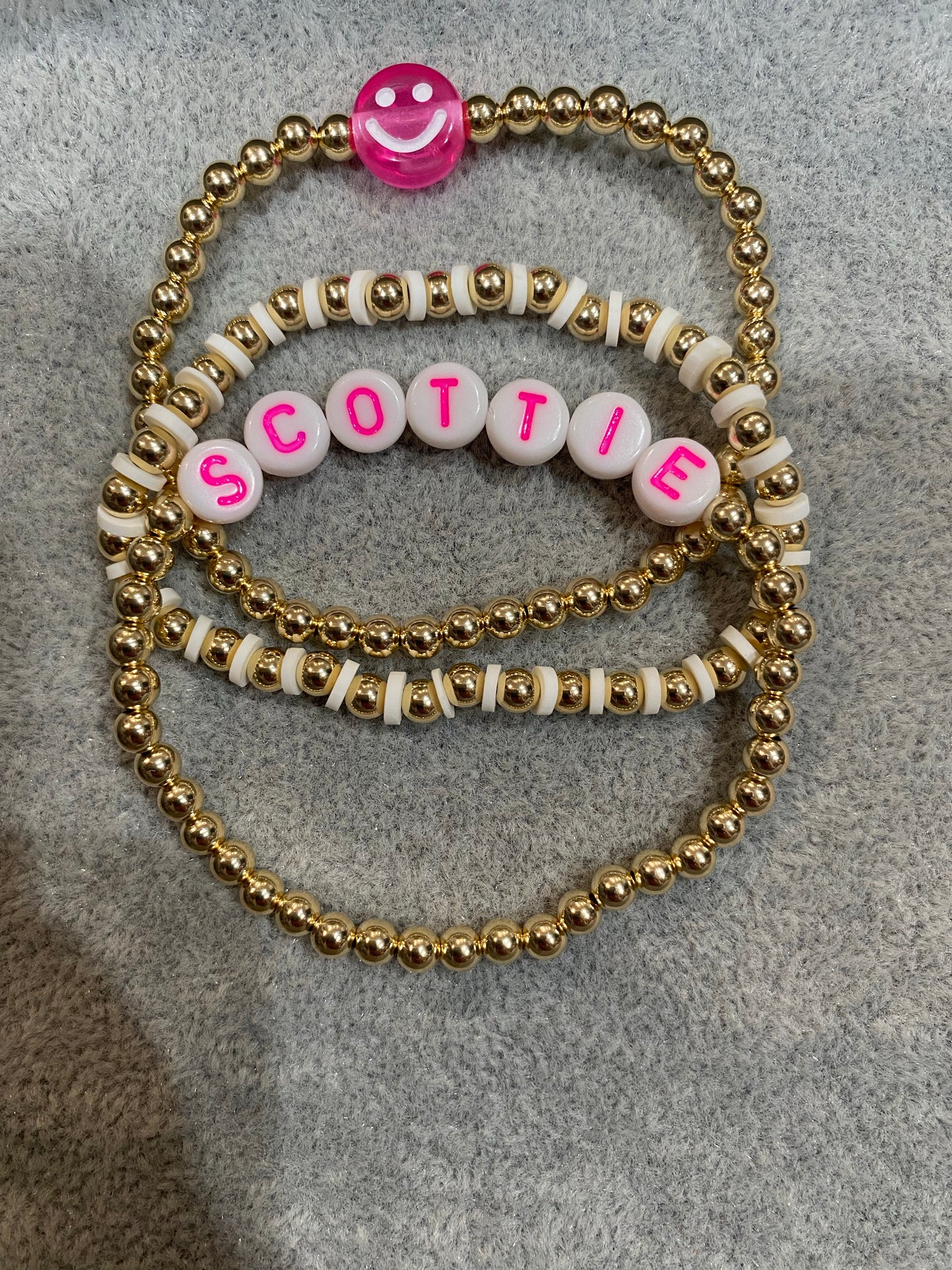 4mm 14 k gold ball with vinyl disc between each bead